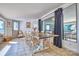 Spacious dining room with large table, perfect for gatherings, with view of the lake at 5390 Hudson Rd, Lake Wylie, SC 29710