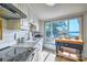 Charming kitchen offers white cabinets, sleek appliances, and a picturesque lake view at 5390 Hudson Rd, Lake Wylie, SC 29710