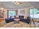 Comfortable living room featuring a plush sectional sofa, and lots of light at 5390 Hudson Rd, Lake Wylie, SC 29710