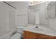 Full bathroom with a shower-tub combo, toilet, and a vanity sink at 5724 Cougar Ln, Charlotte, NC 28269