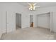 Spacious bedroom with a closet and an ensuite bathroom for added privacy at 5724 Cougar Ln, Charlotte, NC 28269