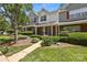 Well-maintained townhomes with lush landscaping and sidewalks at 5724 Cougar Ln, Charlotte, NC 28269