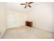 Bedroom with vaulted ceilings and a ceiling fan, with a window at 610 Mountain Pl, Albemarle, NC 28001