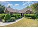 Charming brick home with a well-maintained landscaped front yard and inviting walkway at 610 Mountain Pl, Albemarle, NC 28001