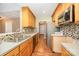 Well-equipped kitchen with stainless steel appliances, tile backsplash, and ample cabinet space at 610 Mountain Pl, Albemarle, NC 28001