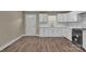Bright kitchen with shaker cabinets, quartz countertops, and stainless steel appliances at 6208 Karenstone Dr, Charlotte, NC 28215