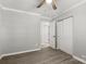 Neutral bedroom with closet and ceiling fan at 6515 Santa Cruz Trl, Charlotte, NC 28227