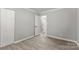 Clean, bright bedroom with ample closet space and neutral decor at 6515 Santa Cruz Trl, Charlotte, NC 28227