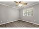 Bedroom features wood-look floors and natural light at 6515 Santa Cruz Trl, Charlotte, NC 28227