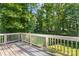 View from deck overlooking trees and backyard at 6515 Santa Cruz Trl, Charlotte, NC 28227