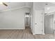 Bright hallway and kitchen featuring a modern design and light color palette at 6515 Santa Cruz Trl, Charlotte, NC 28227
