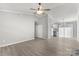 Open-concept room features vaulted ceilings, modern lighting and new floors at 6515 Santa Cruz Trl, Charlotte, NC 28227