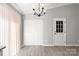 Inviting living room with large closet, back door access, and modern finishes at 6515 Santa Cruz Trl, Charlotte, NC 28227