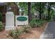 Pullen Green HOA community entrance sign with brick pillars and lush landscaping at 7014 Walton Heath Ln, Charlotte, NC 28277