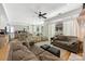Expansive living room seamlessly connecting to the kitchen and dining area, ideal for modern living at 7014 Walton Heath Ln, Charlotte, NC 28277
