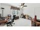 Bright office with a large window, ceiling fan, and office furniture at 7014 Walton Heath Ln, Charlotte, NC 28277