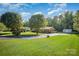 Brick home on expansive lot, showcasing lush greenery and long driveway at 753 Briarfield Rd, Rock Hill, SC 29730