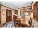 Inviting dining area with a wooden table and views into the kitchen at 753 Briarfield Rd, Rock Hill, SC 29730