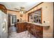 Well-equipped kitchen features wooden cabinetry, practical countertops, and a cozy breakfast bar area at 753 Briarfield Rd, Rock Hill, SC 29730