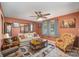 Cozy living room features a comfortable sofa, patterned rug, and plenty of natural light at 753 Briarfield Rd, Rock Hill, SC 29730