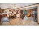 Open floor plan with tile floors, seamlessly connecting the kitchen, dining and living areas at 753 Briarfield Rd, Rock Hill, SC 29730