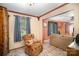 Sitting area featuring a comfortable chair and large windows for natural light at 753 Briarfield Rd, Rock Hill, SC 29730