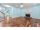 Living room featuring a fireplace and hardwood floors at 8000 Pelorus Ln, Charlotte, NC 28269