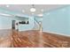 Open floorplan features a kitchen, staircase, and living room at 8000 Pelorus Ln, Charlotte, NC 28269