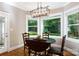 Bright dining area features bay window and hardwood floors at 804 Creek Bluff Rd, Rock Hill, SC 29732