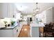 Modern kitchen with white cabinetry, stainless steel appliances, and a spacious island at 804 Creek Bluff Rd, Rock Hill, SC 29732