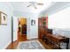 Office space features wood floors, a ceiling fan, and a window at 804 Creek Bluff Rd, Rock Hill, SC 29732