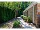 Mature trees add privacy to the side yard of this home at 804 Creek Bluff Rd, Rock Hill, SC 29732