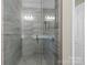 Clean and modern bathroom featuring a clear glass shower enclosure and updated fixtures at 1033 12Th Avenue Nw Dr, Hickory, NC 28601