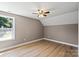 Comfortable bedroom with a modern ceiling fan and natural light at 1033 12Th Avenue Nw Dr, Hickory, NC 28601