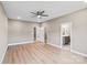 Spacious bedroom with ensuite bathroom entrance, featuring hardwood floors and neutral paint at 1033 12Th Avenue Nw Dr, Hickory, NC 28601