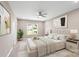 Stylishly staged bedroom featuring ample natural light, a ceiling fan, and neutral décor at 1033 12Th Avenue Nw Dr, Hickory, NC 28601
