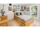 Stylish bedroom with natural light, comfortable furniture, and decor at 1115 Berry Ridge Rd, Charlotte, NC 28270