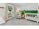 Bright Bedroom with playful wallpaper and comfortable furnishings at 1115 Berry Ridge Rd, Charlotte, NC 28270