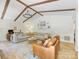 Bright living room with vaulted ceilings, exposed beams, hardwood floors, and comfortable seating at 1115 Berry Ridge Rd, Charlotte, NC 28270