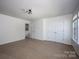 Neutral bedroom with large double door closet and lots of natural light at 116 Kingsway Dr, Mooresville, NC 28115