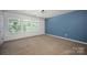 Bright, airy bedroom with plenty of natural light at 116 Kingsway Dr, Mooresville, NC 28115