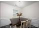 Inviting dining room with a large wooden table set for a gathering at 116 Kingsway Dr, Mooresville, NC 28115