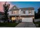 Charming two-story home with stone accents, blue shutters, and a well-manicured front lawn at 116 Kingsway Dr, Mooresville, NC 28115
