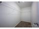 This walk-in closet features wire shelving for optimal storage solutions at 116 Kingsway Dr, Mooresville, NC 28115