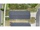 Stunning aerial view of a home with a fenced yard and modern roof at 135 Orson Oaks Ln, Pineville, NC 28134