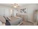 Inviting bedroom featuring a comfortable bed, dresser, and ensuite bathroom at 135 Orson Oaks Ln, Pineville, NC 28134