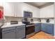 Modern kitchen features stainless steel appliances, granite countertops, and ample cabinet space at 14755 Lions Paw St, Charlotte, NC 28273