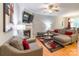 Inviting living room features a fireplace, hardwood floors, and comfortable seating at 14755 Lions Paw St, Charlotte, NC 28273