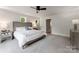 This bedroom offers a neutral palette, plush carpeting, and comfortable design at 1517 Falcon St, Charlotte, NC 28211