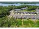 Beautiful aerial view of a lakeside neighborhood with well-maintained homes and lush greenery at 18027 Wilbanks Dr, Charlotte, NC 28278